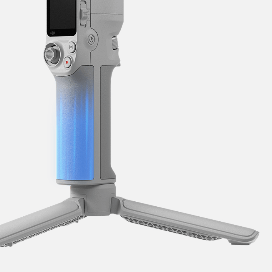 Gray smartphone stand with blue light on a white background